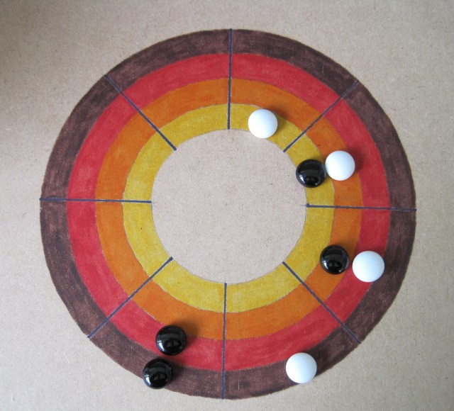 White's winning spiral in Circular Tic Tac Toe